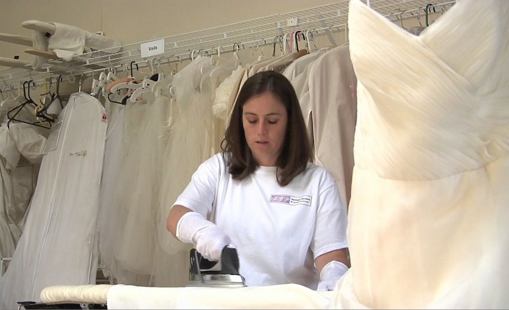 pressing a wedding dress