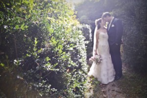 In the woods - Jennifer and husband for wedding dress story