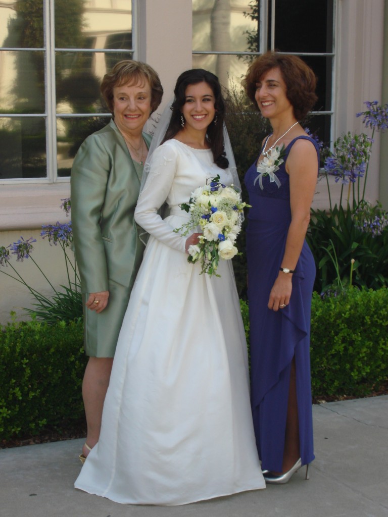 Janet, Cyndi, and Teri have each worn the Priscilla of Boston gown.