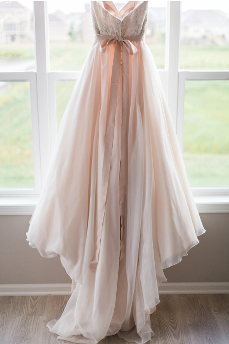 Blush wedding gown pinned from stylemepretty.com