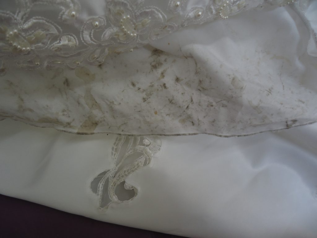 After wedding dress restoration close up