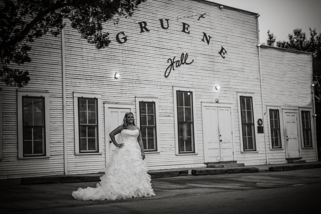 Fun black and white bridal photo of wedding dress preservation customer