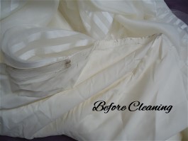 Gen's wedding dress hemline needs thorough wedding dress cleaning.