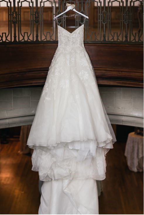 Stephanie's Lela Rose wedding dress is ready for her on her wedding day. It is beautiful.