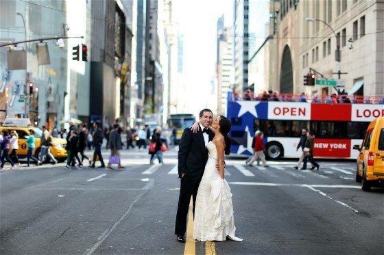 Nikki and Jason enjoy a city romp on their wedding day. Wedding dress cleaning and wedding dress preservation will return the gown to a beautiful condition.