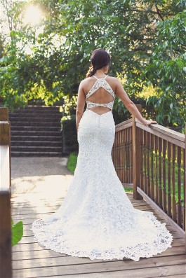Jessica's wedding dress is perfect to show off her lovely figure.