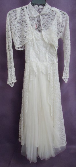 Joyce's vintage wedding dress After wedding dress restoration.