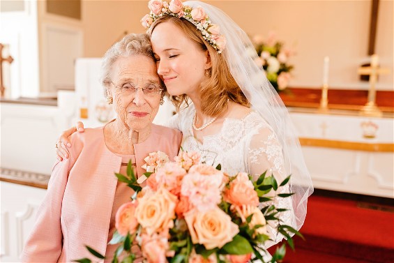 Ellen with her grandmother Jeweldine on her wedding day. Ellen is wearing her grandmother's wedding gown after wedding dress restoration.