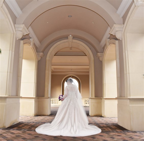 Stunning back view of Ilyse on her wedding day. Wedding dress preservation will keep her gown in beautiful condition.