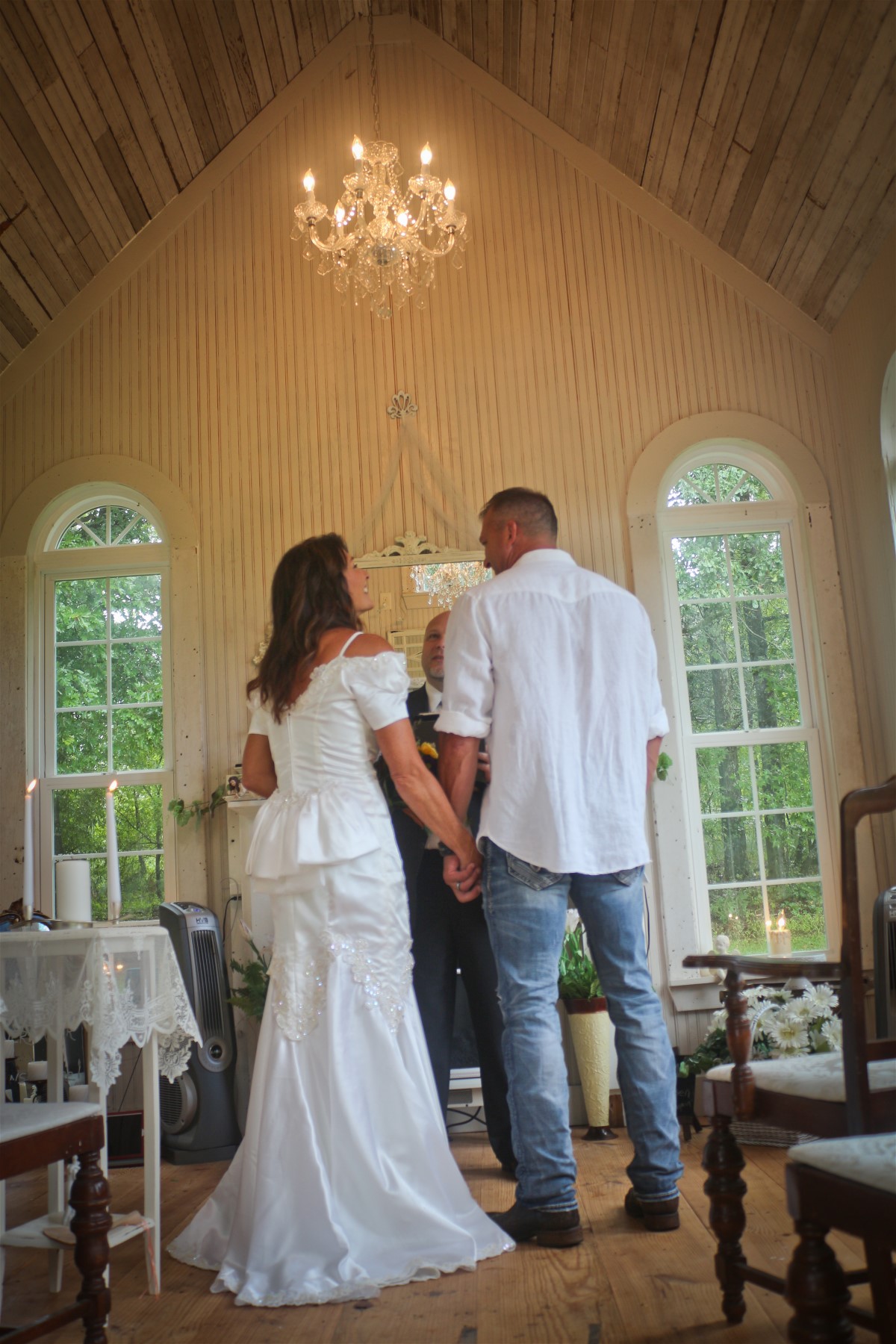 Robin and husband celebrate silver anniversary with vow renewal. Wedding dress cleaning made her gown lovely.