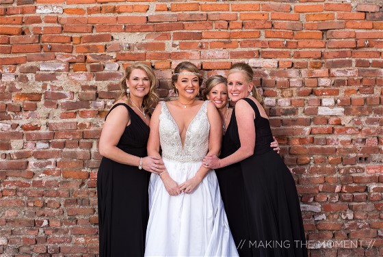 Milisa and bridesmaid enjoy her wedding day. Wedding dress preservation will keep her gown beautiful.