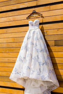 Loren's gorgeous Lazaro wedding dress will be kept lovely with expert wedding dress preservation.