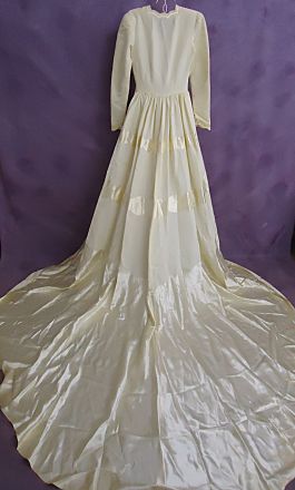The back of Monette's wedding gown before restoration.