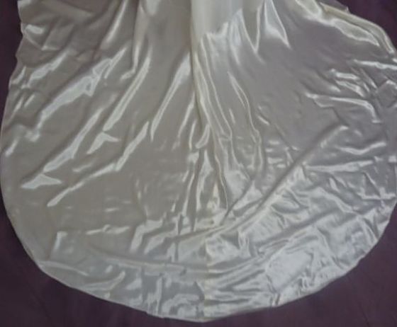Monette's wedding gown train after restoration and stains removed.