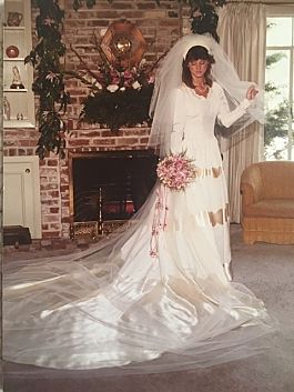 Monette in her mother's wedding gown at her own wedding in 1983.