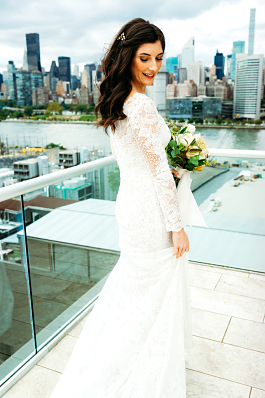 Brittany's Ivory and nude synthetic Atelier Pronovias wedding dress with lace overlay