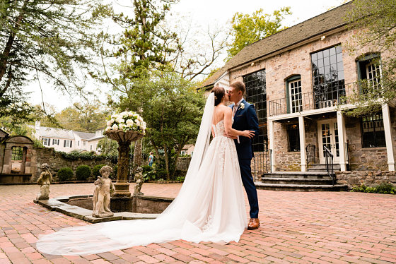 Laura's gorgeous gown and cathedral veil