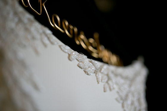 Detailed stitching on Rebecca's gown