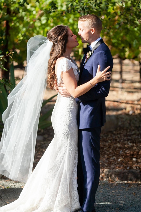 Ally and her husband on their wedding day