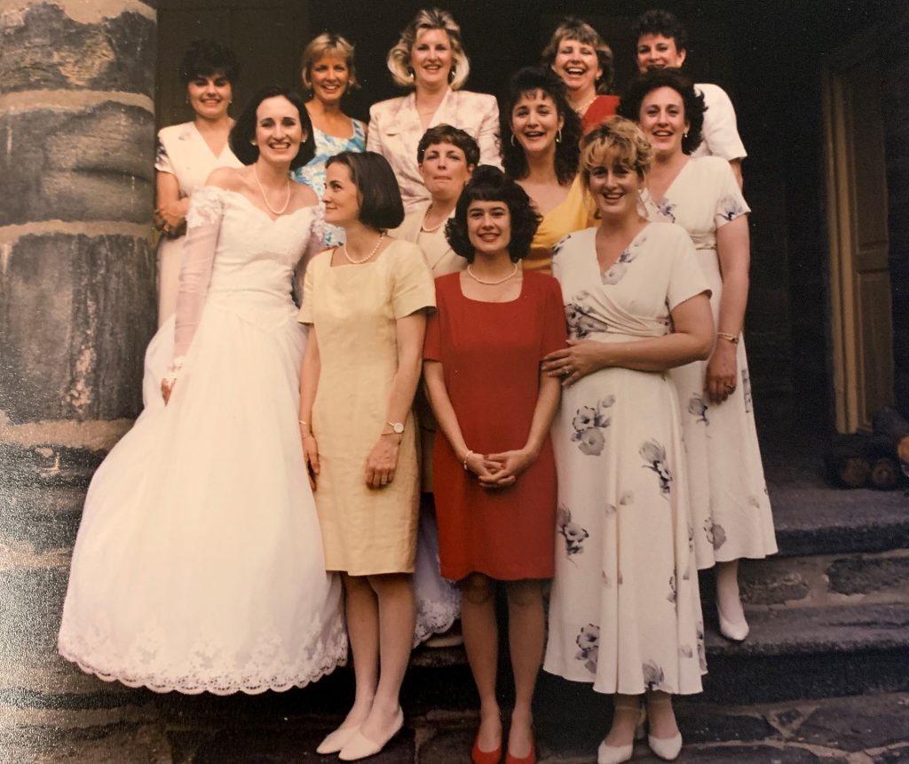 Noreen in her wedding gown with her friends during wedding reception