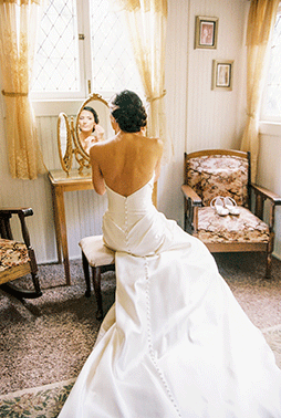 Despite hurting when sitting, Lauren loved the buttons on the back of the wedding dress.