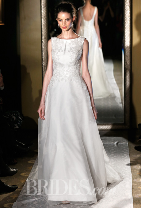 This Spring 2015 Oleg Cassini wedding dress looks great on the runway. Courtesy of Brides.