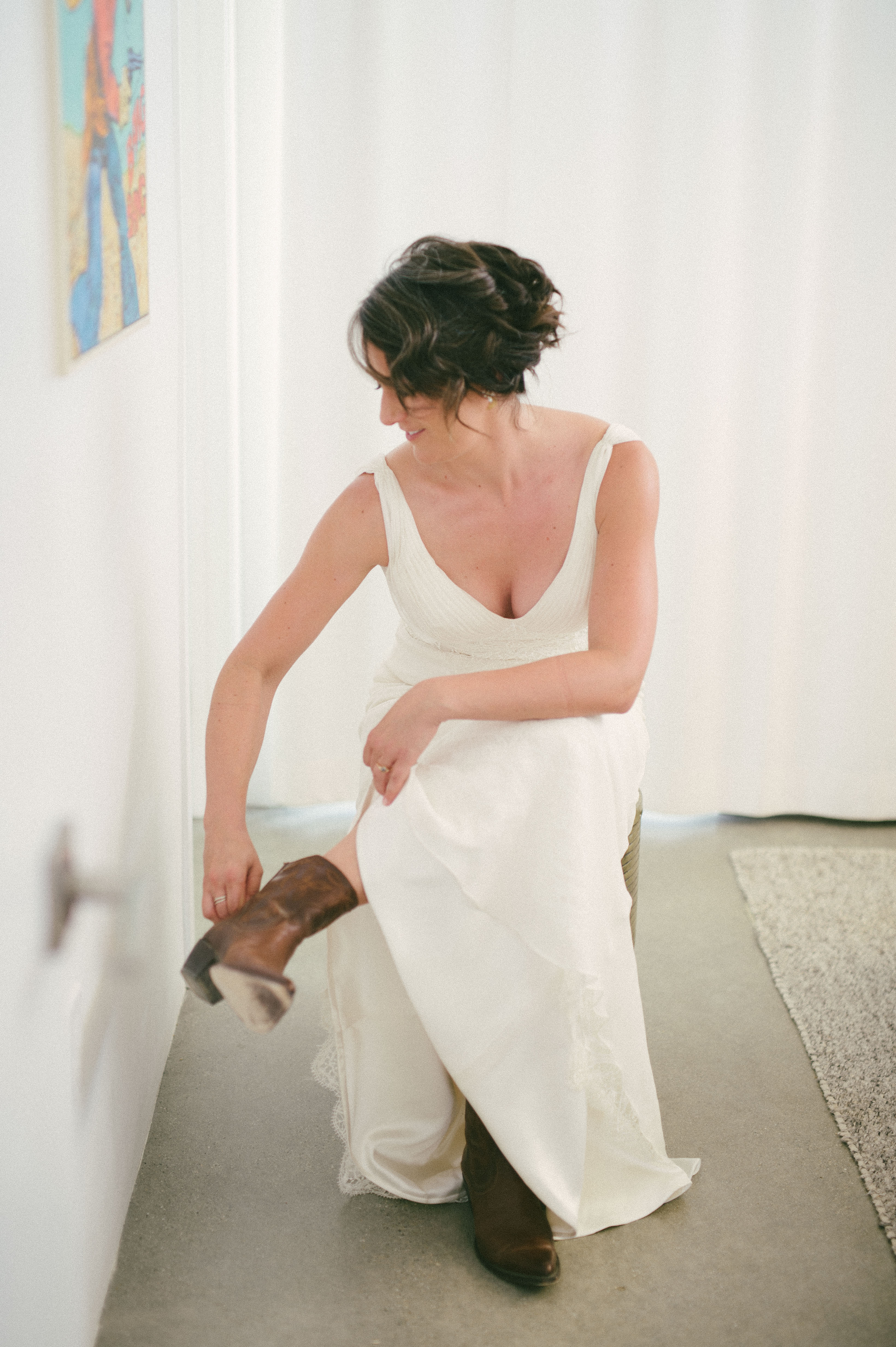 Heidi wore cowboy boots for her desert wedding