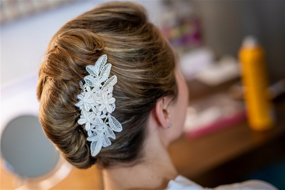 Meredith's lace hairpiece was cut from mother's wedding dress lace.