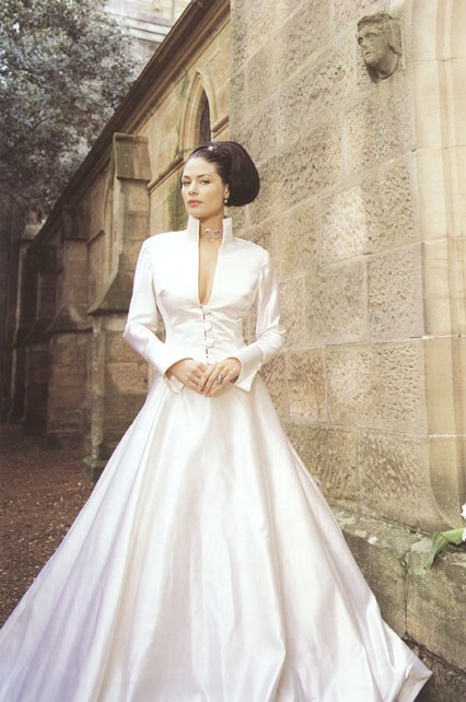 Stylish Angelina wedding dress by Basilica is perfect for a winter wedding.